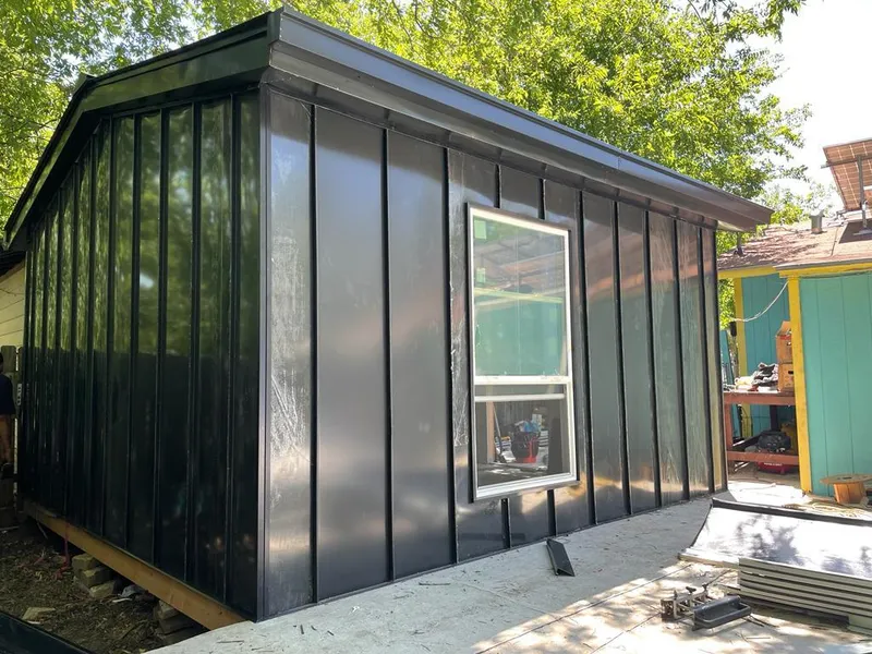 Black standing seam metal wall panels for Roof Inspection in Herriman